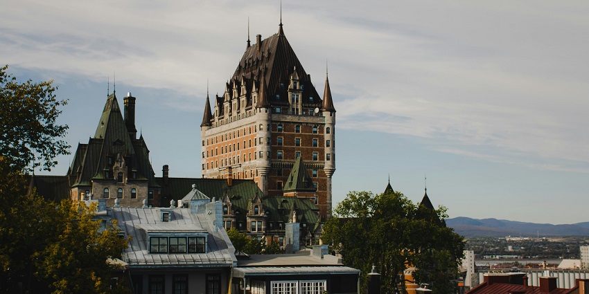 The famous Hotel known as Chateau Frontenac at night is located in Quebec City.