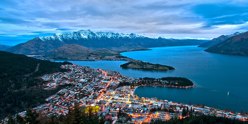 A breathtaking view of a lake while skydiving in Queenstown, New Zealand