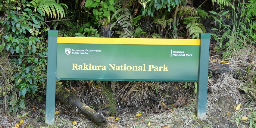 Rakiura National Park on Stewart Island, showcases rainforests and golden beaches