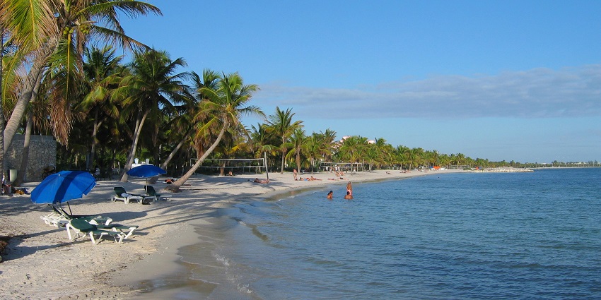 A beautiful early morning view with a clouded sky at Smathers Beach in Key West, Florida