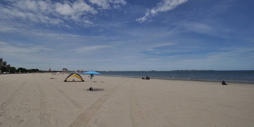View of Revere Beach in Massachusetts, showcasing the sandy shoreline and calm waters