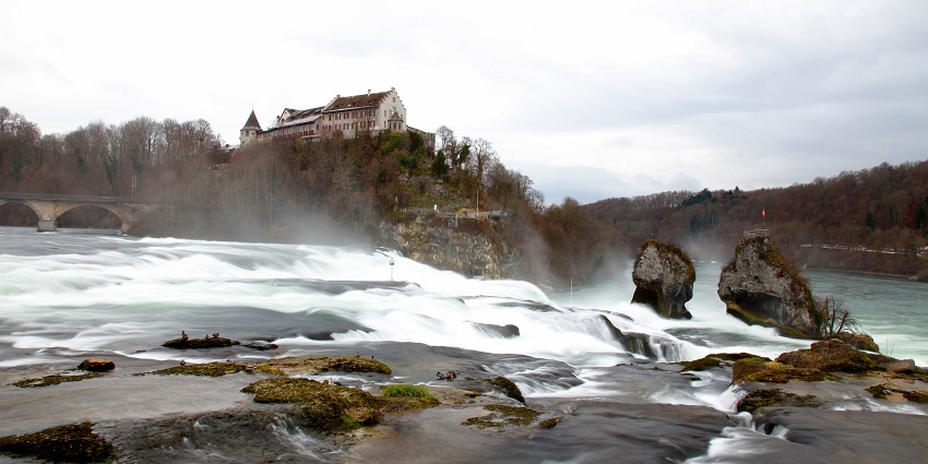 Switzerland waterfalls with powerful cascades and scenic surroundings.