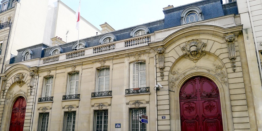 Luxury shopping street with designer boutiques and high-end fashion.