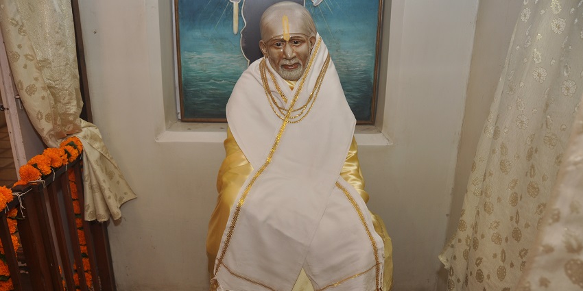 The idol of Sai Baba sitting at one of the Dehradun Temples