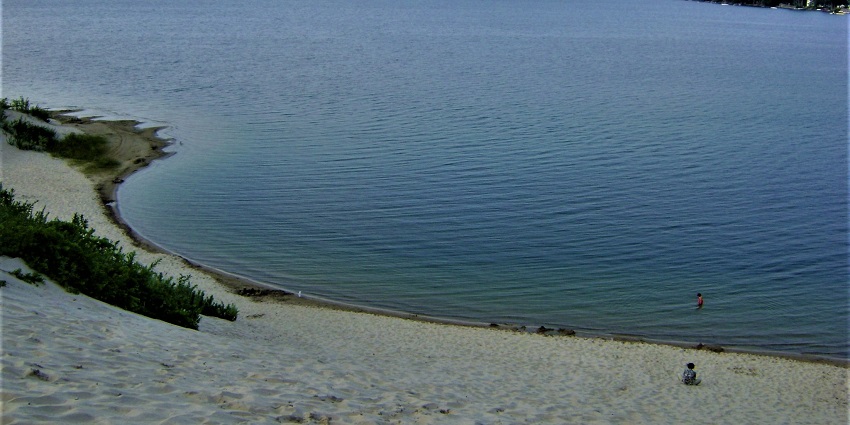 An image showing a view of the Sandbanks Provincial Park, a popular tourist attraction in Ontario.