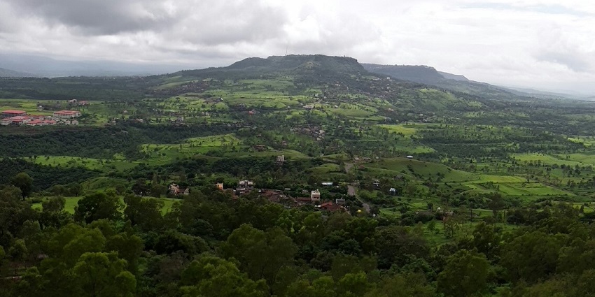 A scenic view of Sandhan Valley, which is ideal for Bhandardara trekking.