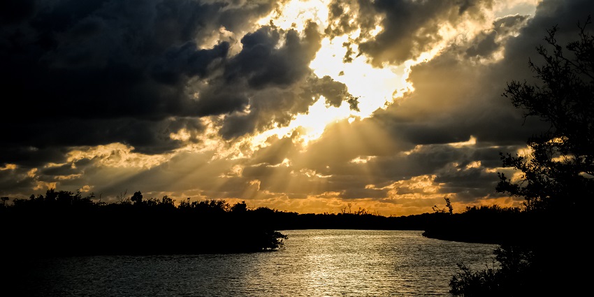 Sunset view over calm waters at Sanibel Island, a famous Island in Florida for beach lovers