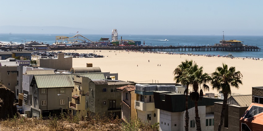 An image of the iconic Santa Monica Pier at Santa Monica Beach, a popular destination