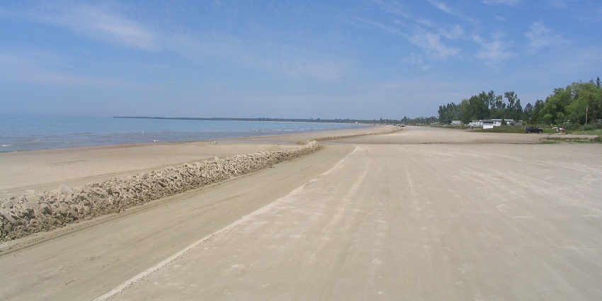 An image showing a view of the Sauble Beach, a famous place to visit in Ontario located in Canada.