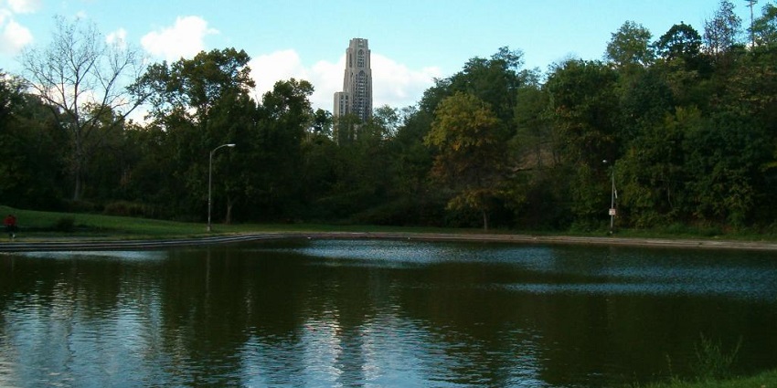 A beautiful view of a lake in Schenley Park, the best spot for Valentine's Day in Pittsburgh.