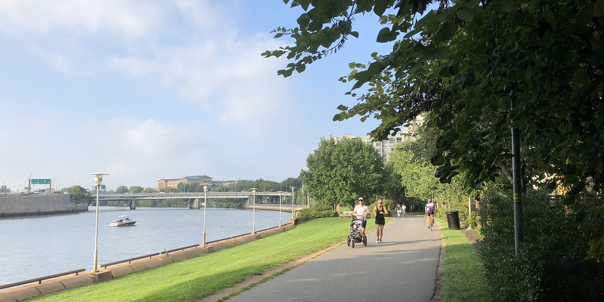 Schuylkill River Trail with people strolling - one of the best things to do in Philadelphia.