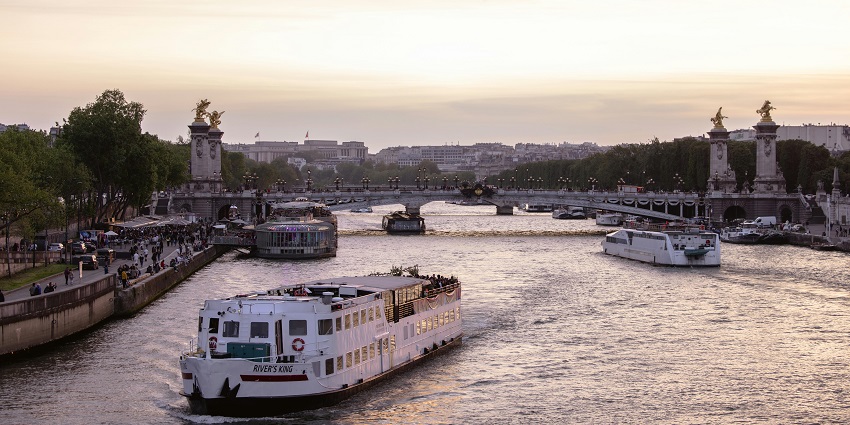 Celebrate Valentine's Day in Paris along the Seine River with Parisian landmarks.