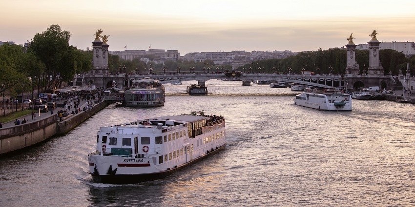 Scenic boat ride showcasing Paris landmarks along the river.