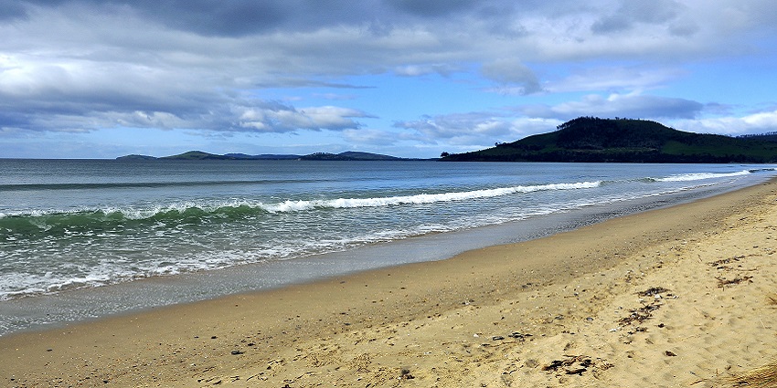Peaceful coastline of Seven Mile Beach, famous beaches in Hobart, Tasmania.
