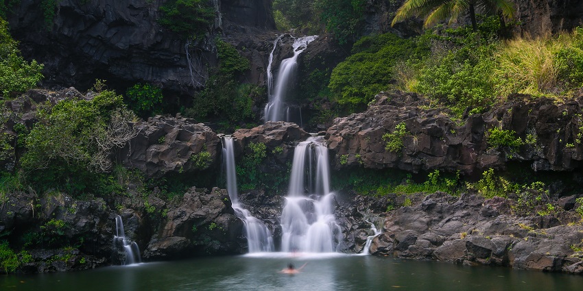 Seven Sacred Pools, a famous spot near Haleakala National Park, with cascading waterfalls.