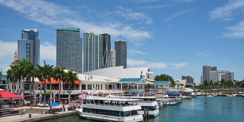 Bayside marketplace with multiple cruise yachts parked - one of the things to do in Miami.