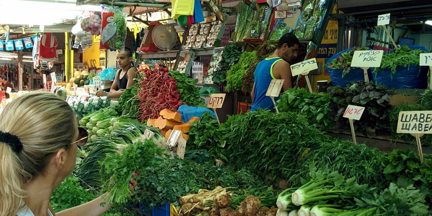 Vibrant marketplace filled with local goods, spices, and souvenirs.