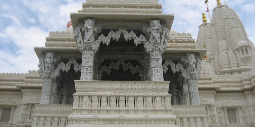 Famous temples in Bahrain dedicated to Lord Swaminarayan with intricate carvings.