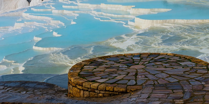 Relax in Pamukkale’s natural thermal pools with stunning white terraces
