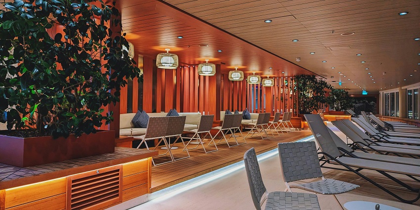 Image of Someplace Else Pub where some are sipping cocktails, enjoying a classy ambience.