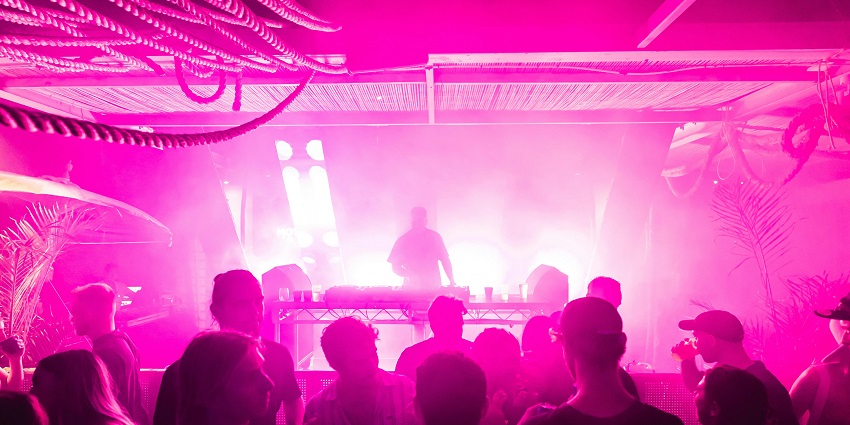 Image of a club with vibrant pink lights - Istanbul nightlife is known for vibrant parties