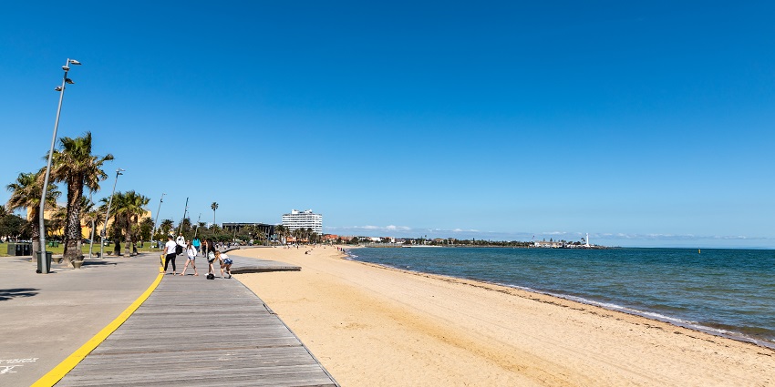 St. Kilda Beach in Melbourne is the best for sun, surf, and city skyline views.