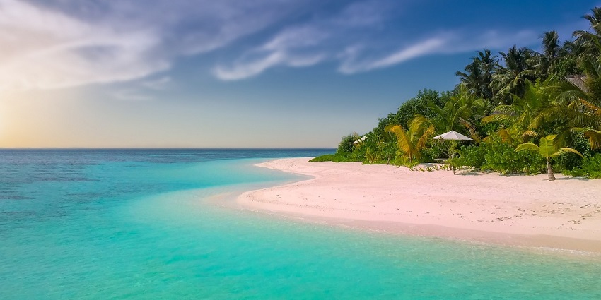 An image of a sunrise on a beach which resembles St. Andrews Beach in Georgia.