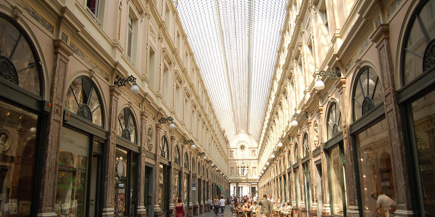 Elegant shopping arcade with luxury boutiques and fine dining options.