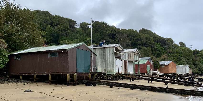 Boatsheds at Stewart Island, one of the islands near New Zealand