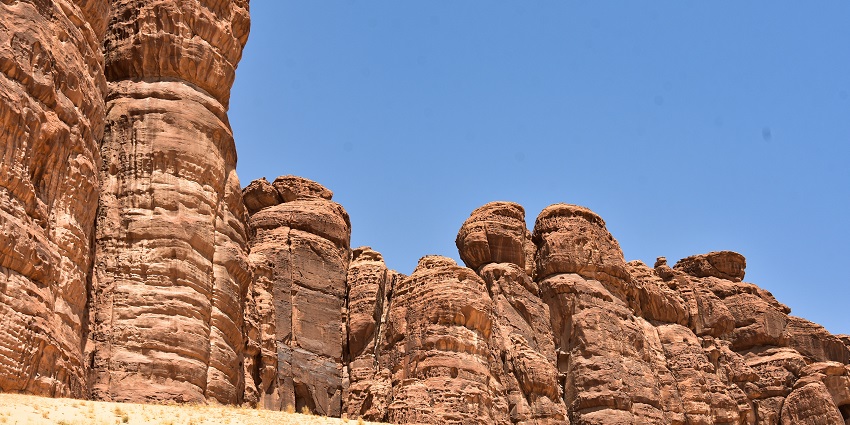 Things to see in Saudi Arabia include visiting historic sites with ancient rock formations and archaeological treasures.