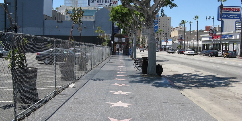 Hollywood Walk of Fame sidewalk with stars and celebrities' names written on them