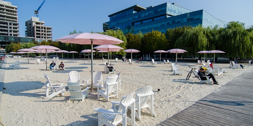 A view of the iconic pink umbrellas at Sugar Beach - one of the beaches near Toronto.