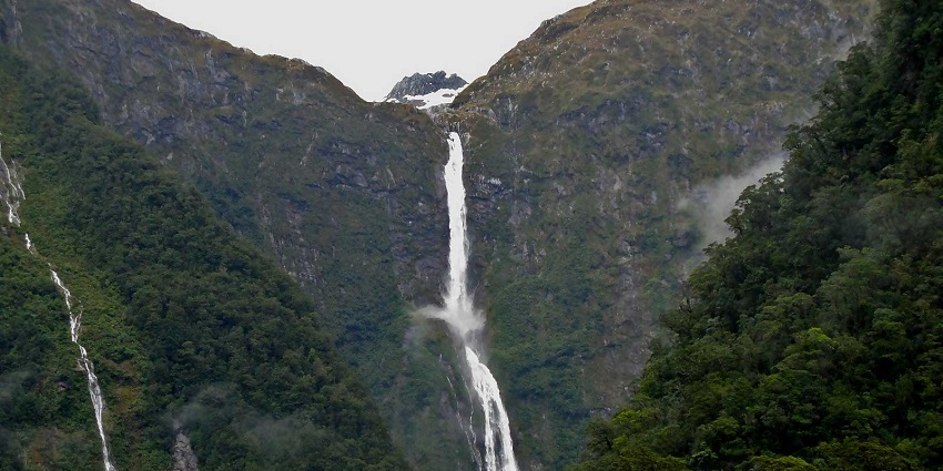 Marvel at one of the tallest New Zealand waterfalls in Fiordland’s rugged beauty.
