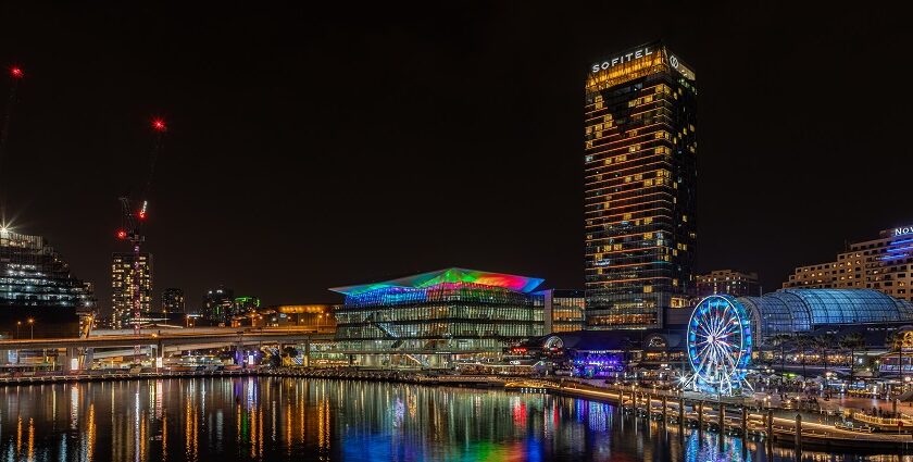 The illuminated skyline highlights the vibrant Sydney nightlife scene.