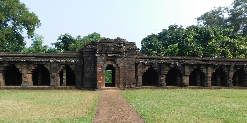 A beautiful view of the green surroundings of the landscape alongside the Kurumbera Fort.