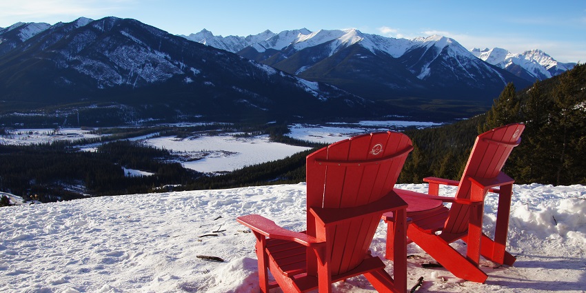 Two chairs with magnificent views of the mountain around Bow Valley in Banff, Alberta.