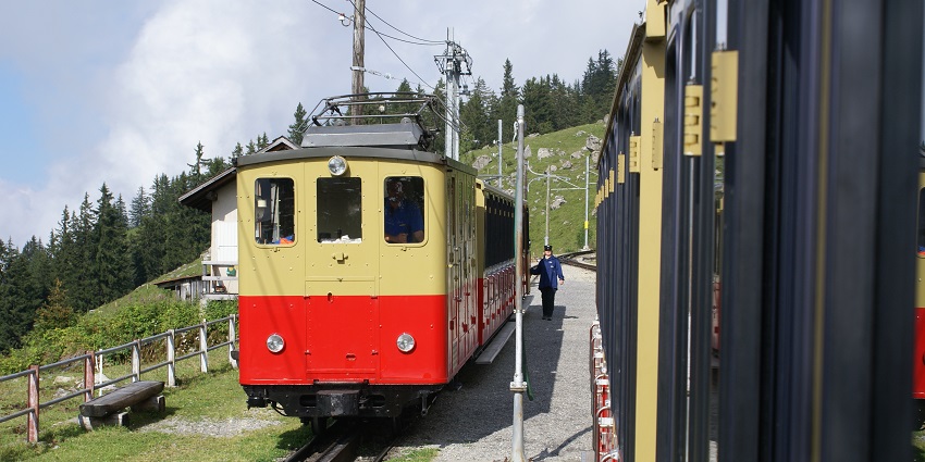 Historic train ride offering panoramic views of Alps and valleys