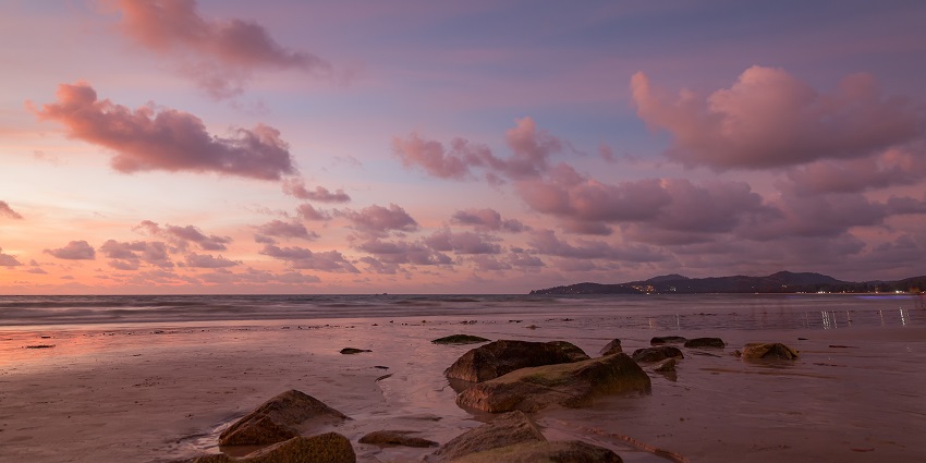 A scenic view of Tao Beach during the sunset, which is a popular beach in Las Vegas.