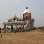 An image of the majestic Tarapith Mandir showcasing its intricate carvings and towering spires.