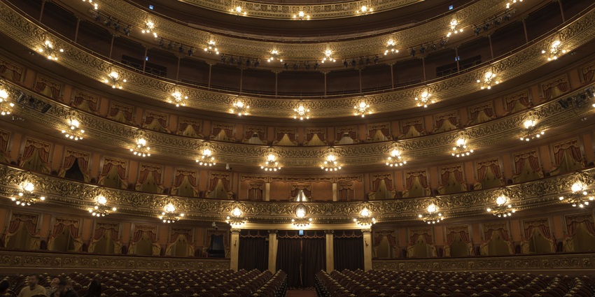 the beautifully lit up Teatro Colón, one of the places to visit in Argentina.