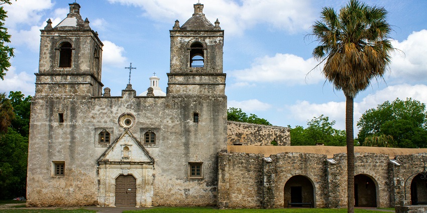 The tourist roaming around the Alamo known as Mission San Antonio de Valero in Texas.