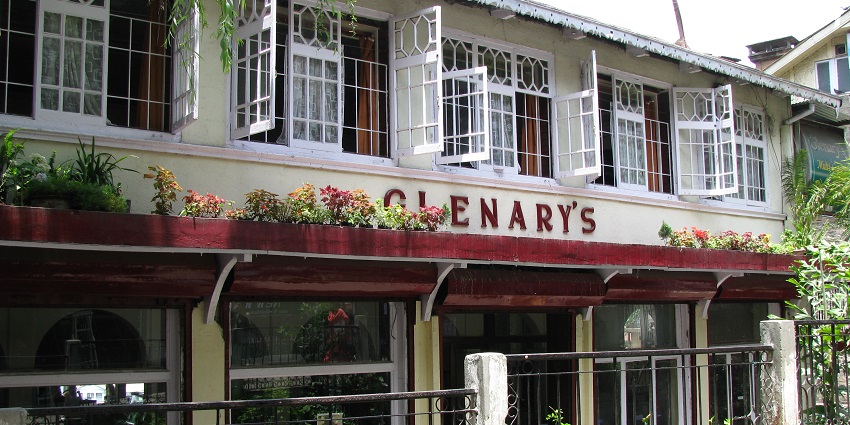 An image of Glenary’s Bakery in Darjeeling shop decorated with natural flowers.
