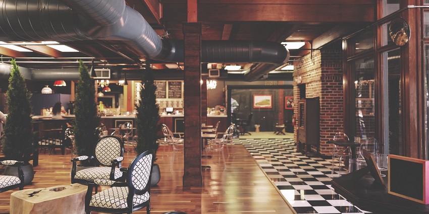 An image of cosy, dimly-lit restaurant interior resembling The Reservoir Lounge.