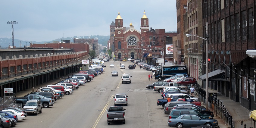 Vibrant view of the Strip District in Pittsburgh, showcasing shops, markets, and local culture.
