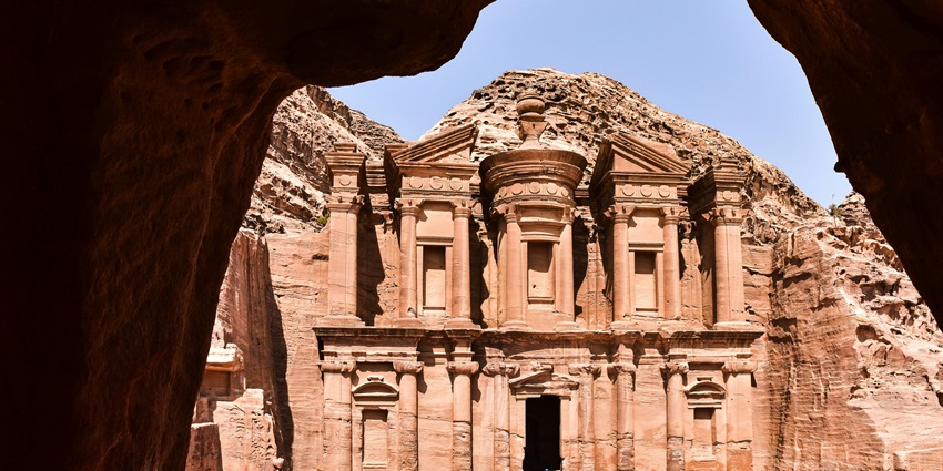 Al-Khazneh Rock-cut Tomb, a Petra monument with intricate carvings and ancient history.