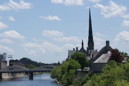 A scenic view of the Grand River in Cambridge, Ontario, Canada, showcasing a riverside landscape