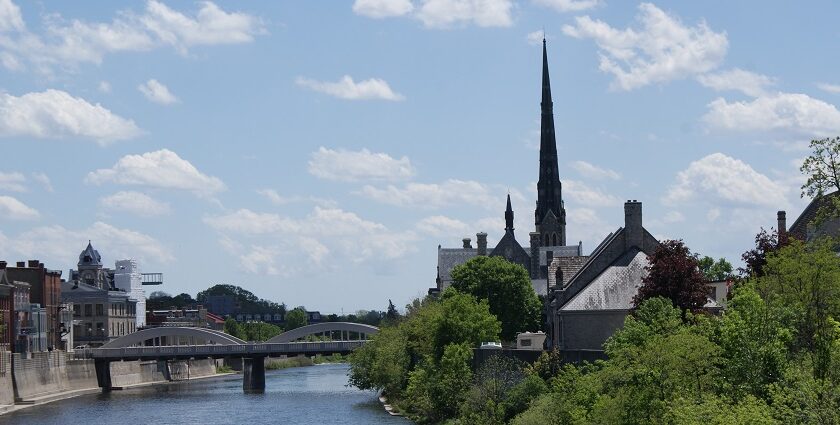 A scenic view of the Grand River in Cambridge, Ontario, Canada, showcasing a riverside landscape