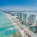 Pristine blue waters of the Caribbean Sea along Cancun’s skylines, one of the things to do in Cancun.