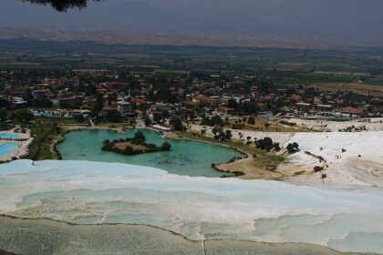 Things to do in Pamukkale include exploring the white terraces, thermal waters, and ancient ruins