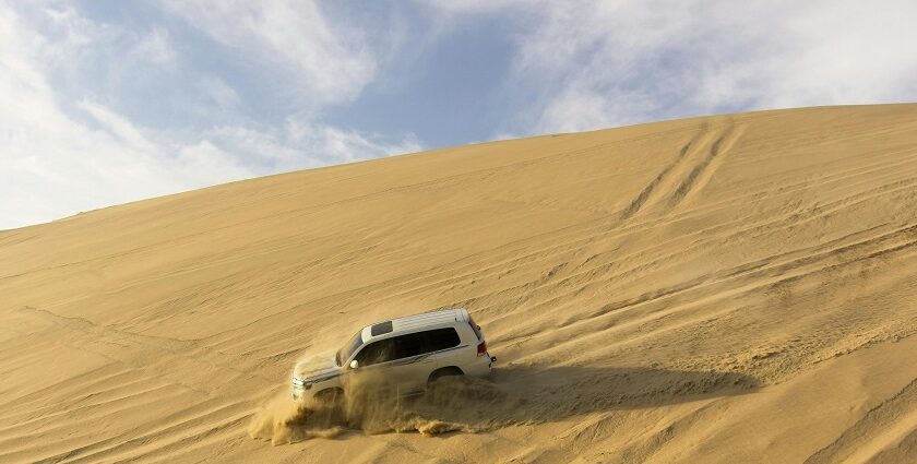 Dune bashing, one of the most popular things to do in Qatar, offers a blend of adventures, culture, sands, and modern attractions.